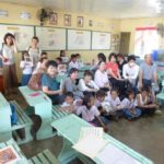 Jan. 22. 2018 – RIMM Rotarians visiting with Japanese Rotarians and guests to distribute school supplies